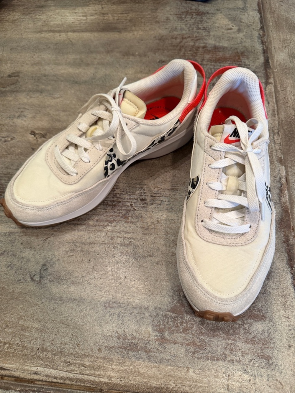 Nike White Sneakers with Black Leopard Swoosh and Coral Lining